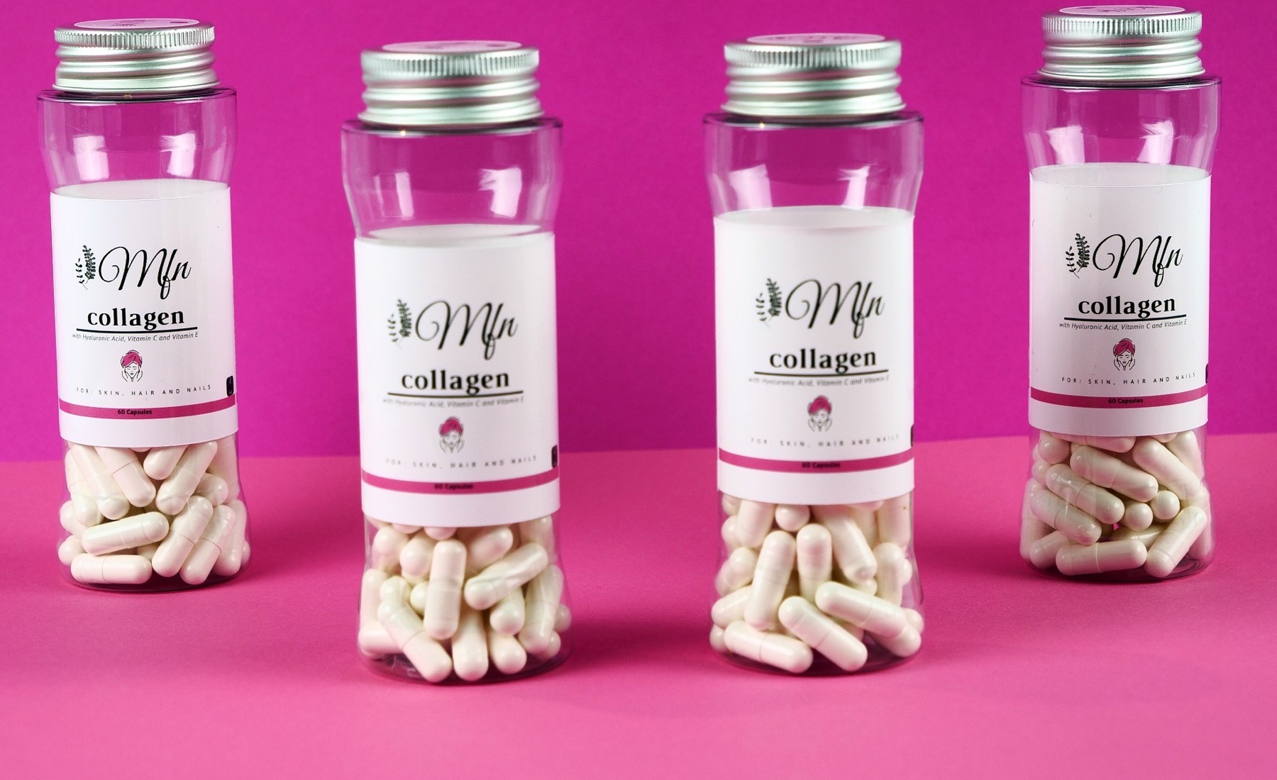 Four bottles of Mundo Fit Natural collagen capsules